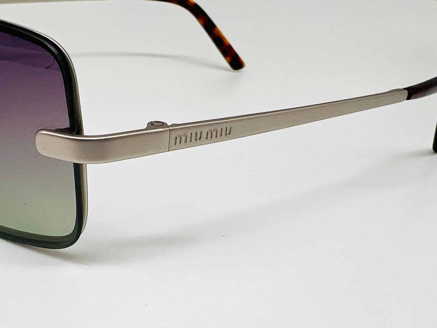 Miu Miu Mod.SMU53B Violet Titanium Frame