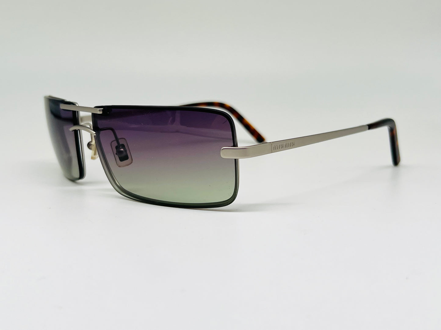 Miu Miu Mod.SMU53B Violet Titanium Frame